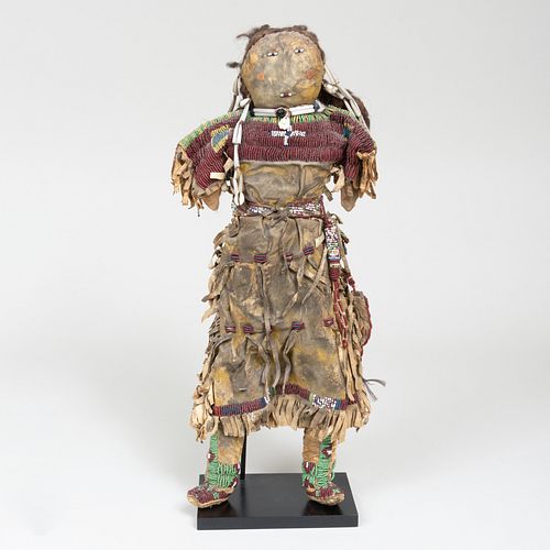 PLAINS BEADED AND HIDE DOLL,