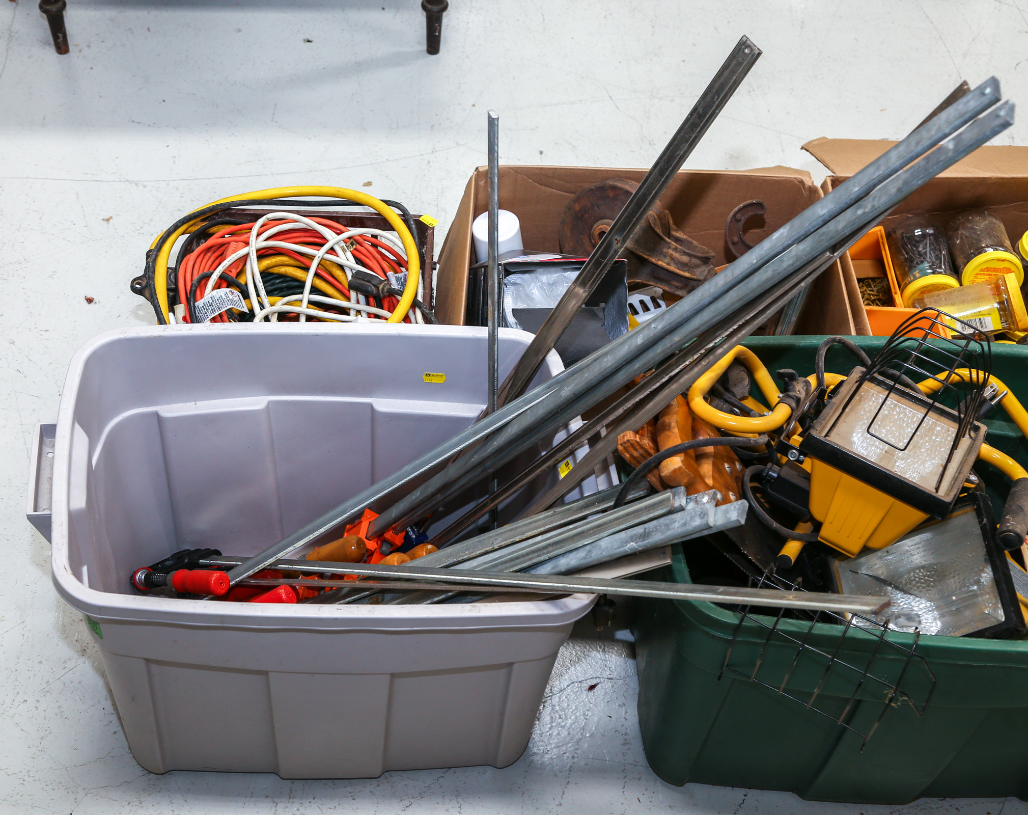 PLASTIC BIN OF BAR CLAMPS .