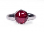 PLATINUM AND CABOCHON RUBY MAN