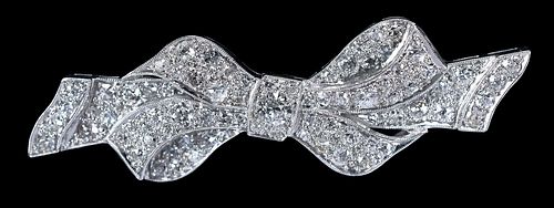 PLATINUM AND DIAMOND BOW BROOCH57