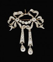 Platinum and diamond bow knot