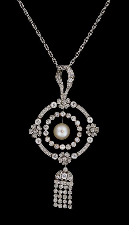 Platinum and diamond circle pendant