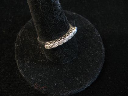 Platinum and diamond wedding band