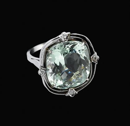 Platinum and large green beryl ring