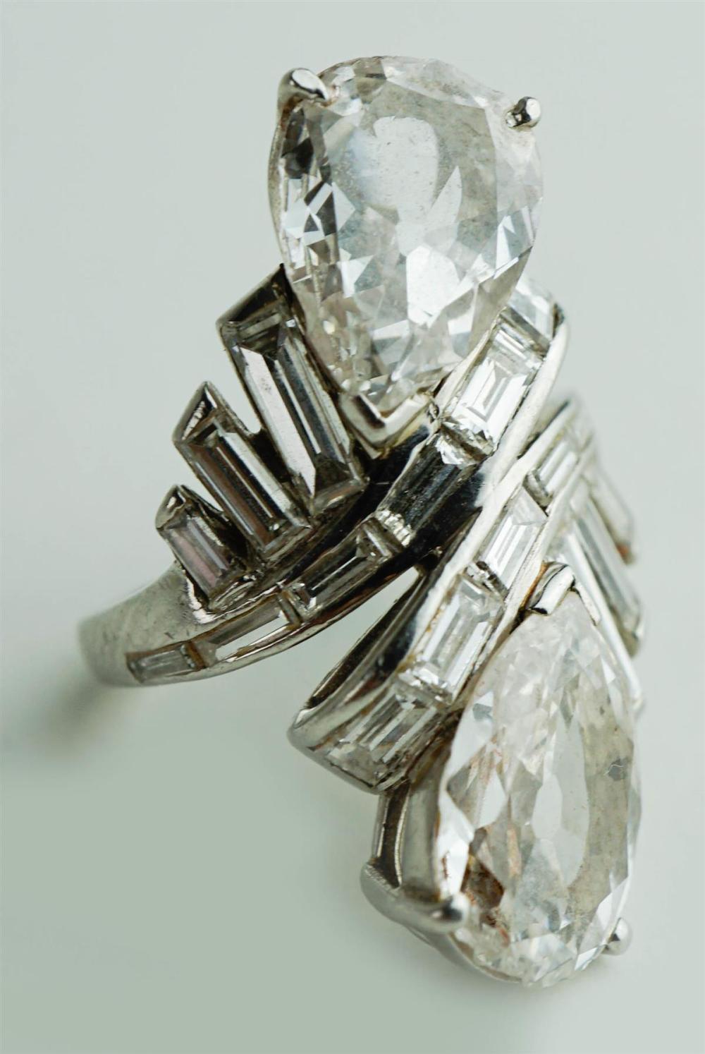 PLATINUM AND OPPOSING PEAR SHAPED