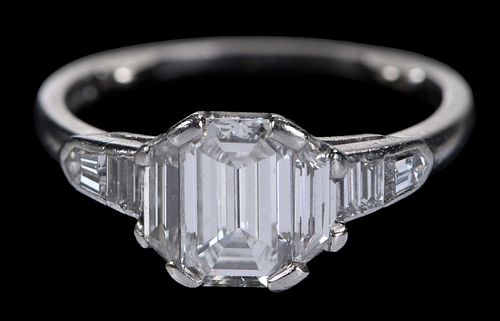 PLATINUM EMERALD CUT DIAMOND RING