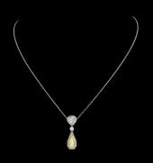PLATINUM FANCY YELLOW DIAMOND