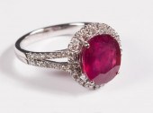 PLATINUM RING WITH RUBY AND DI