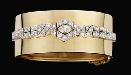 Platinum, yellow gold and diamond