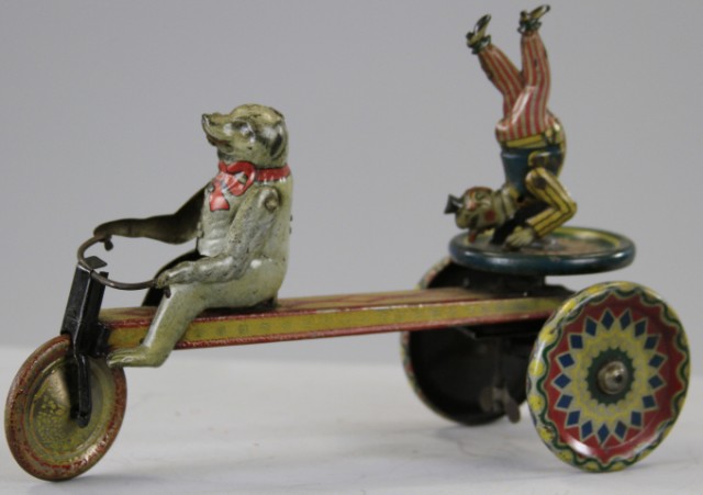 POLAR BEAR DRIVING CLOWN CART