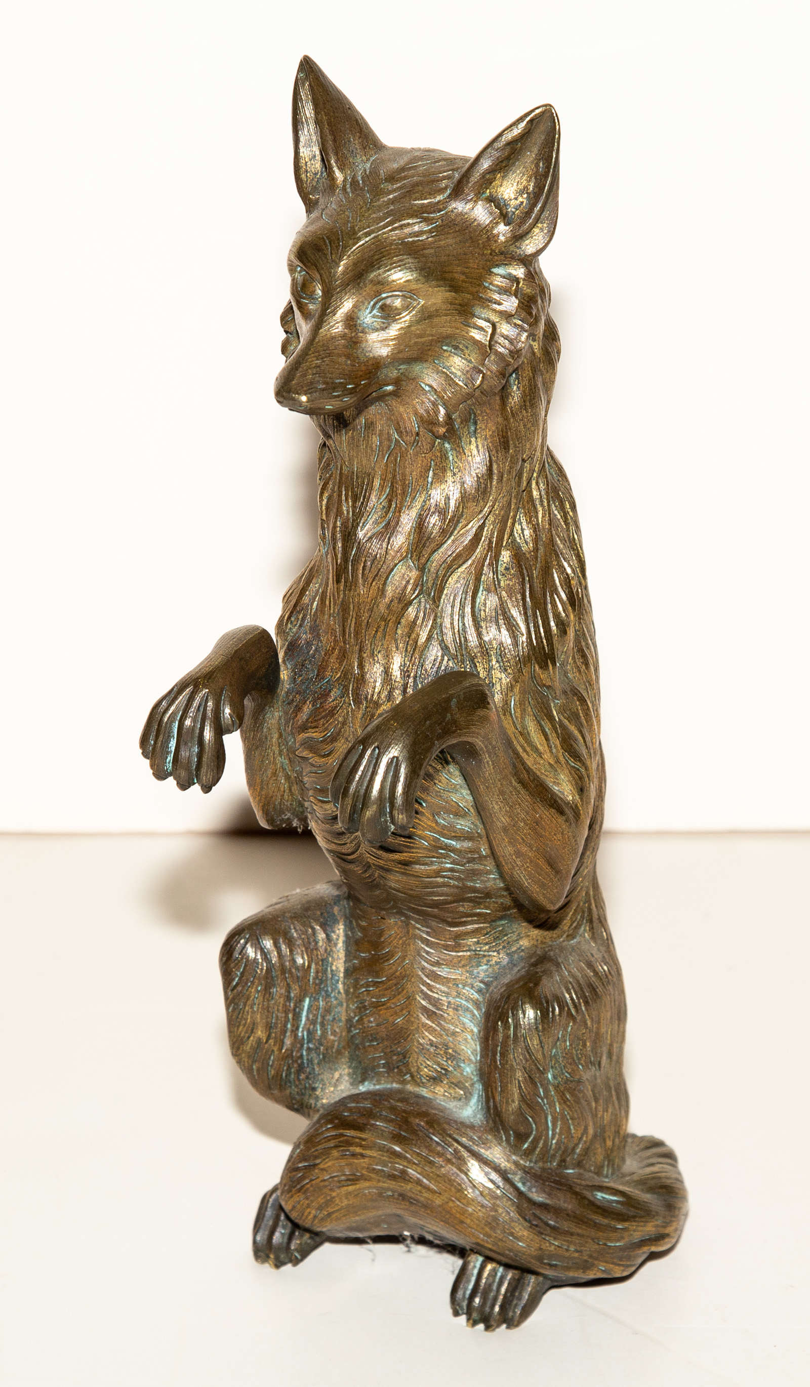 POLISHED BRONZE FIGURE OF UPRIGHT