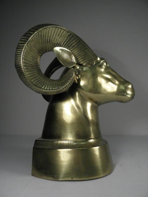Polished gilt metal sculpture of