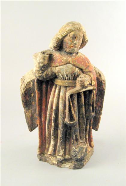 Polychrome carved stone figure of