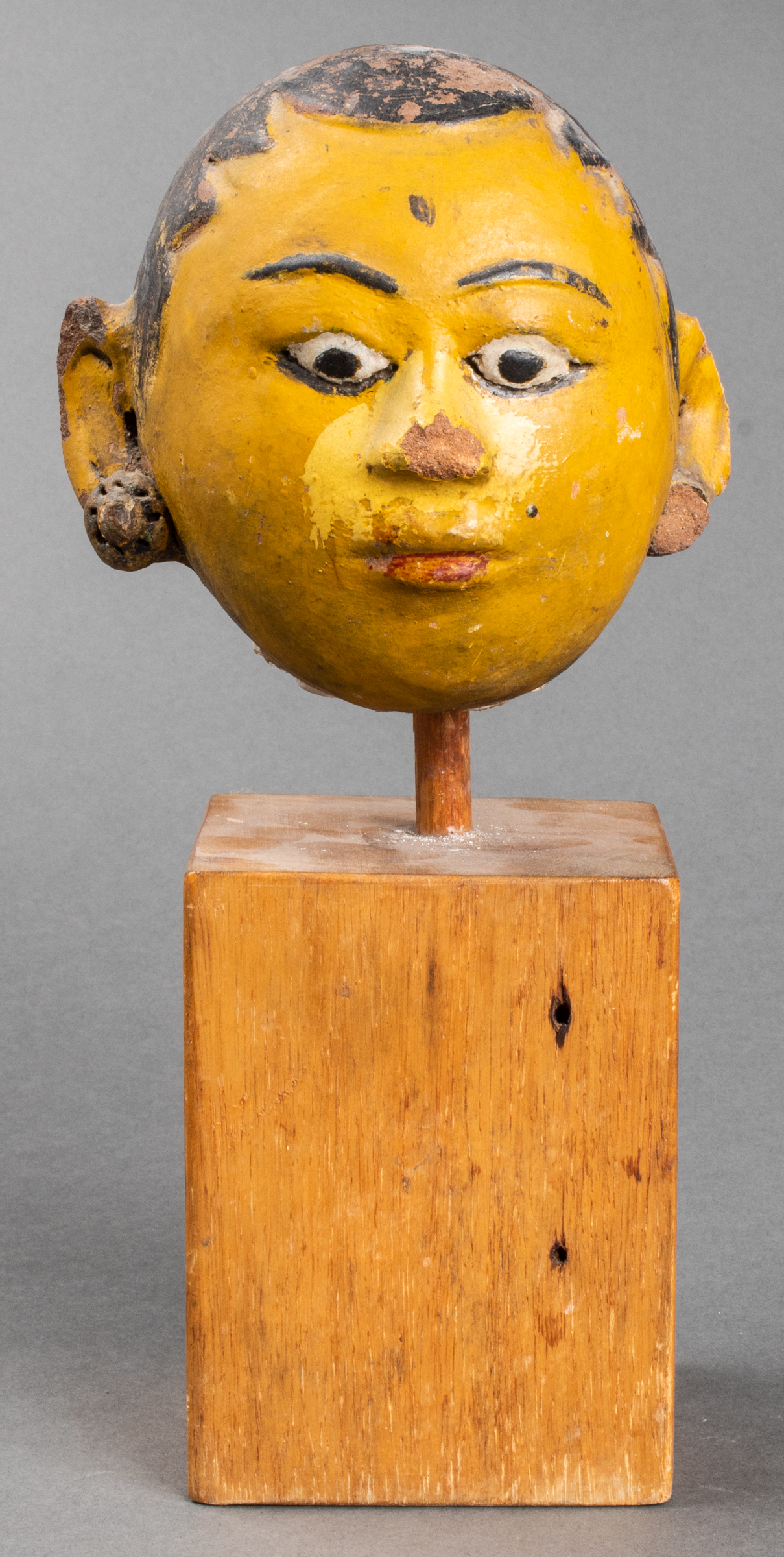 POLYCHROME PAINTED EARTHENWARE HEAD
