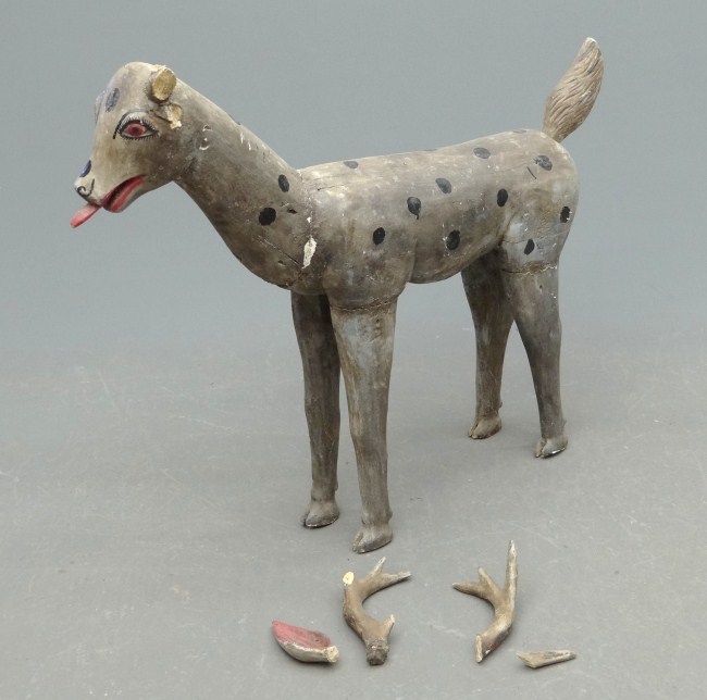 Polychrome painted folk art deer.