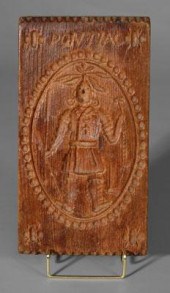 "Pontiac" cookie board, carved