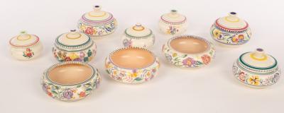 Poole Pottery, four floral lidded