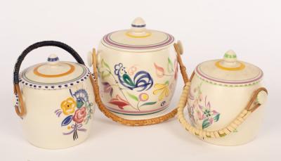 Poole Pottery, three floral biscuit