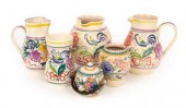 Poole Pottery, three floral ju