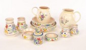Poole Pottery, two floral jugs