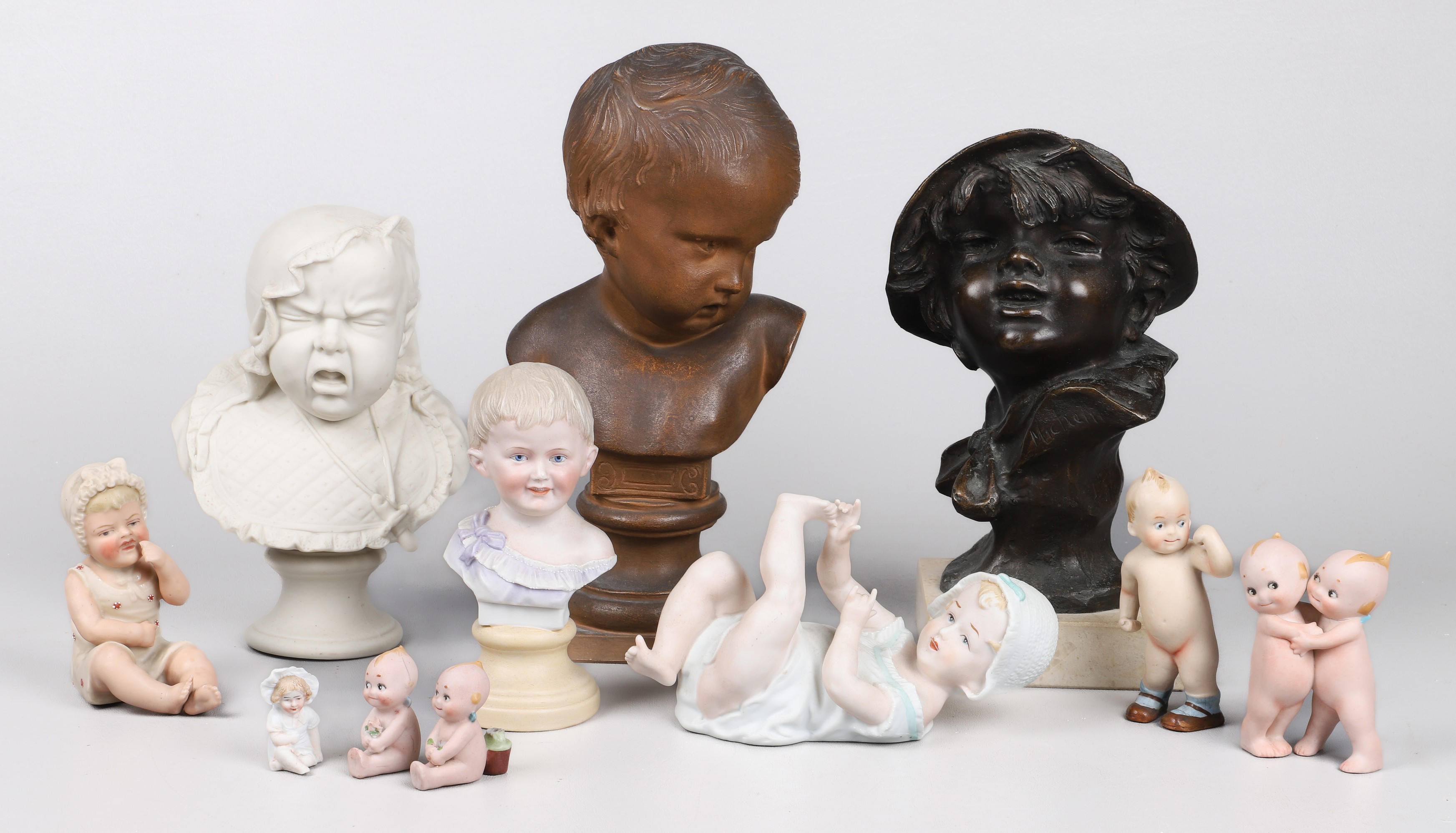 Porcelain baby figures and busts to