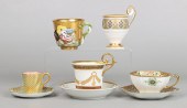 Porcelain cup and saucer group
