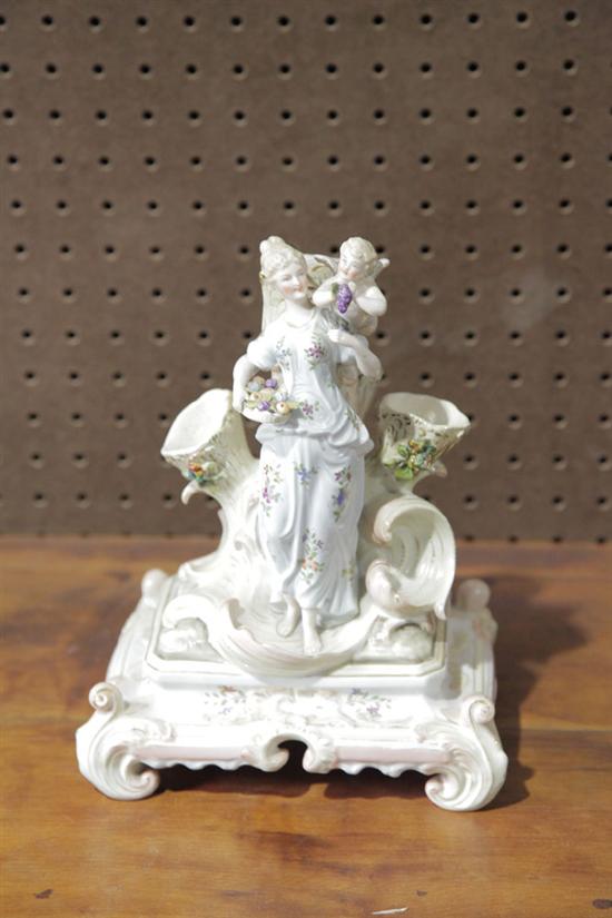 PORCELAIN FIGURAL VASE. Triple vase