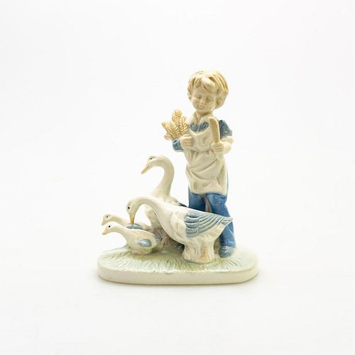 PORCELAIN FIGURINE, BOY WITH