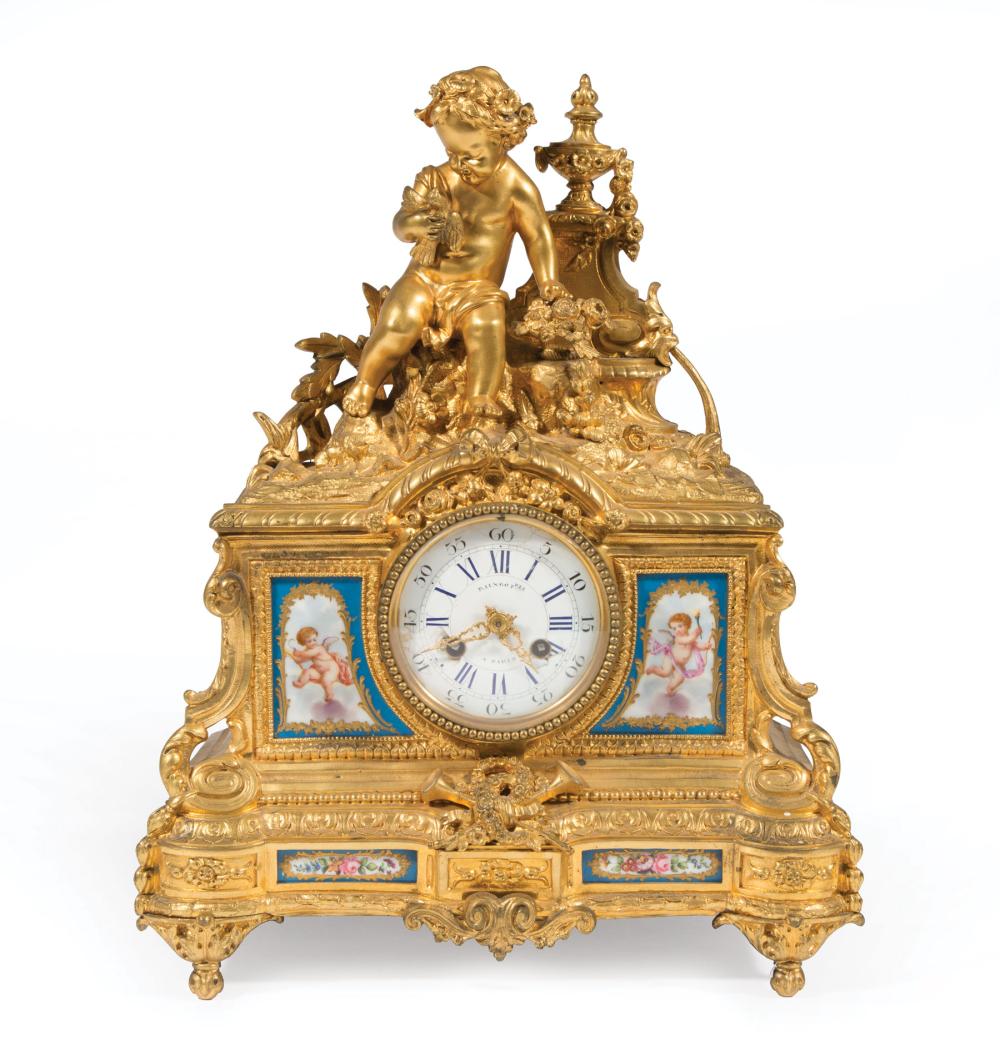 PORCELAIN-MOUNTED GILT BRONZE