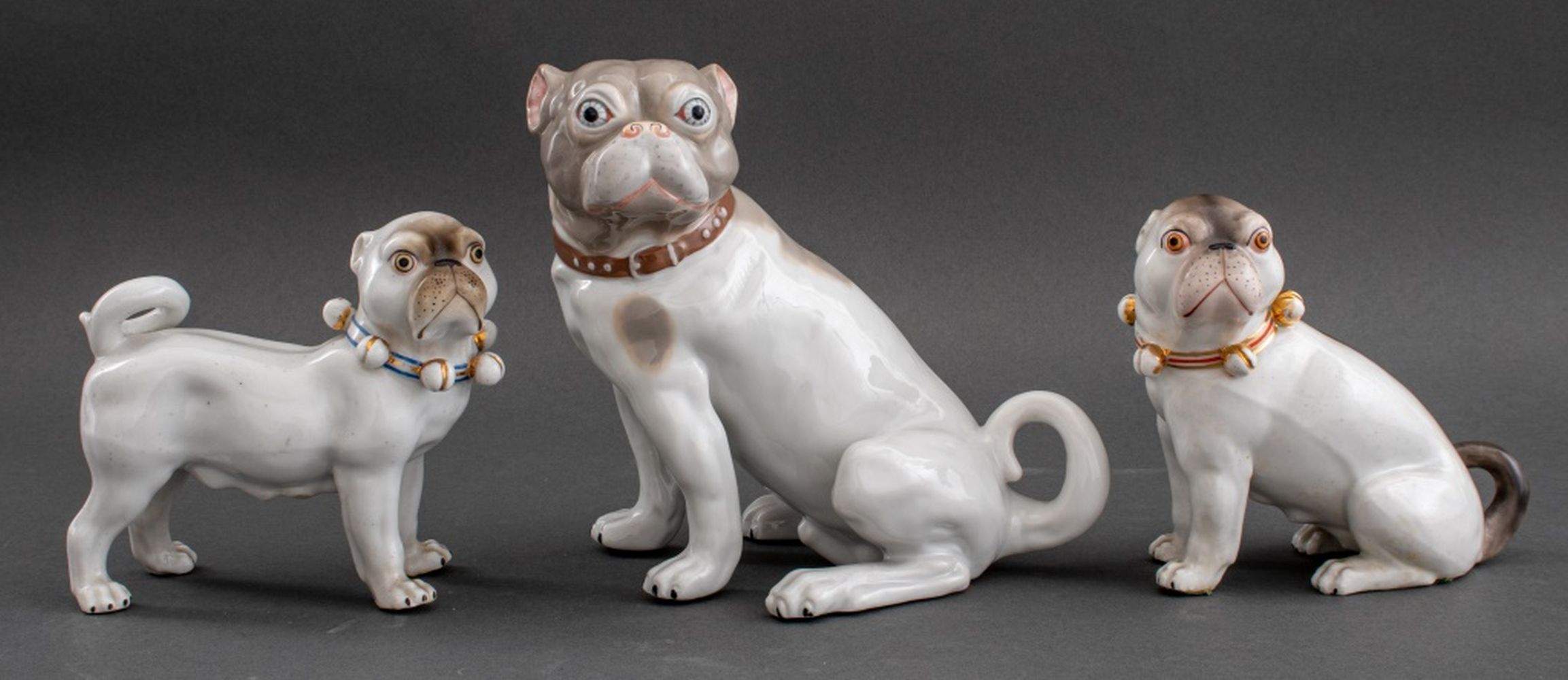 PORCELAIN PUGS FIGURINE, 3 Group of