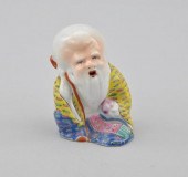 Porcelain Seated Priest Porcel
