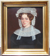PORTRAIT OF A LADY WEARING A W