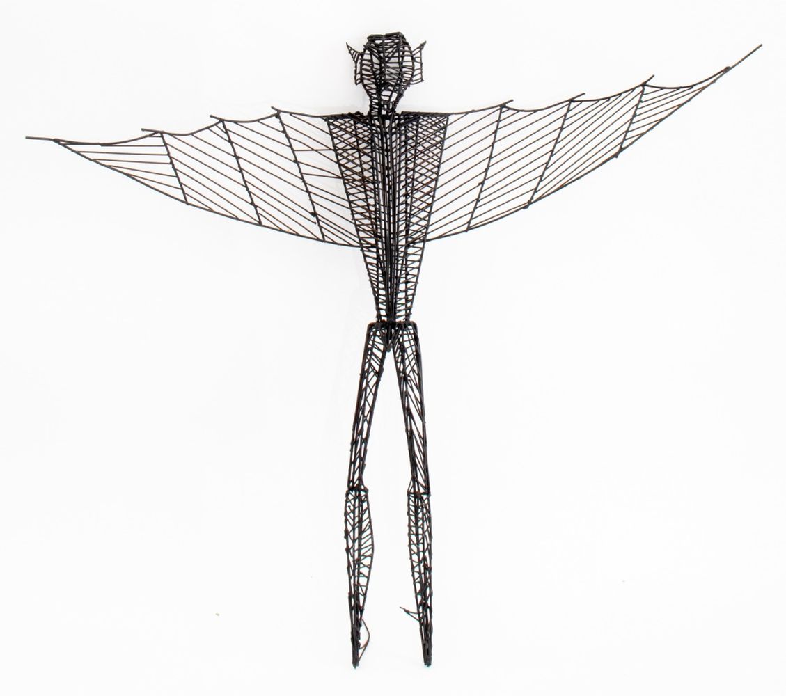 POST MODERN MAN WITH WINGS METAL