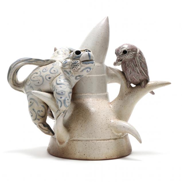 POTTERY SCULPTURE OF MONKEY AND
