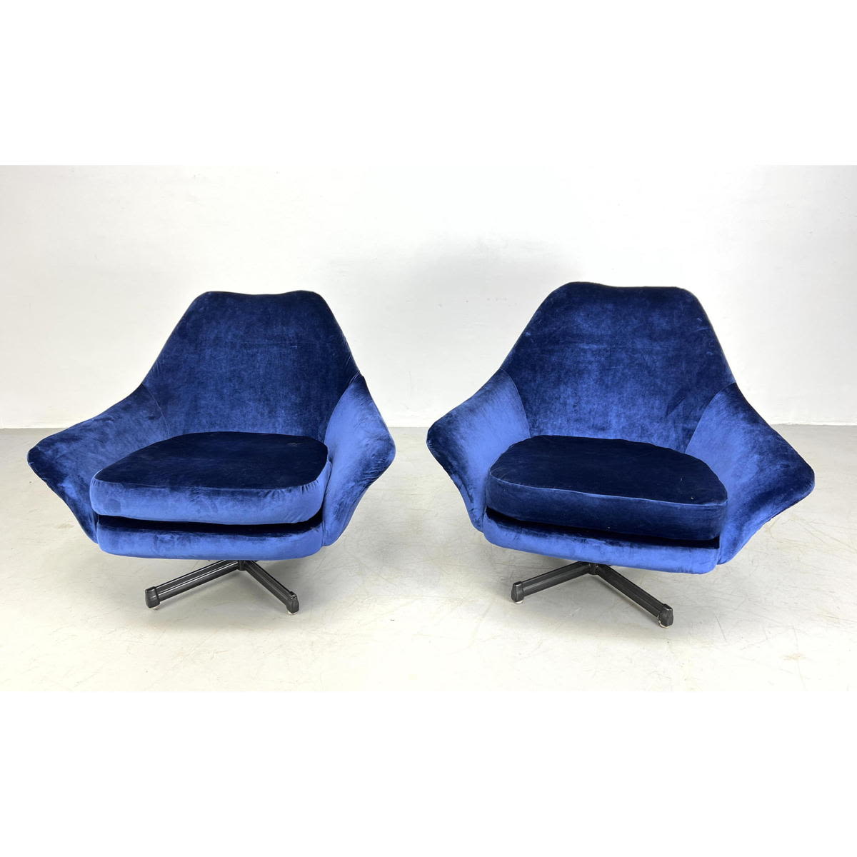 Pr BAUMRITTER Swivel Lounge Chairs.