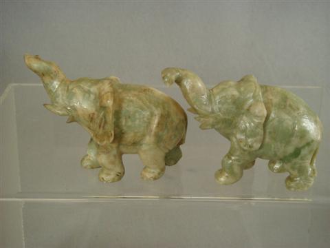 Pr carved jade elephants, 20th c,