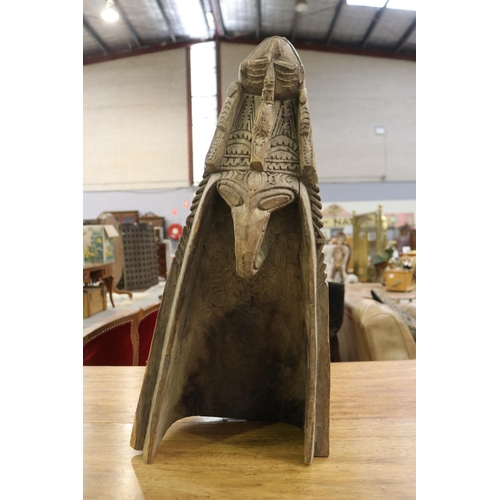 Primitive carved headpiece,