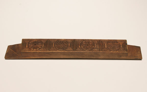 Primitive hand carved hanging