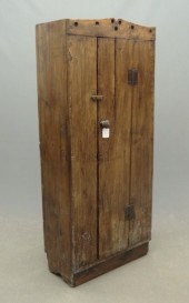 Primitive single door cupboard