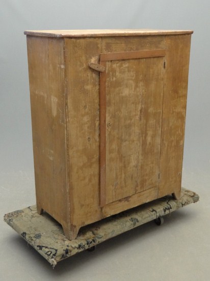 Primitive single door cupboard.