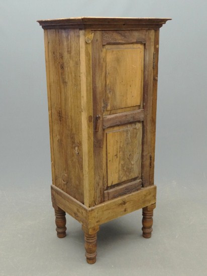 Primitive single door cupboard with