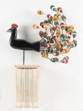PRIMITIVE WOODEN CARVING OF A