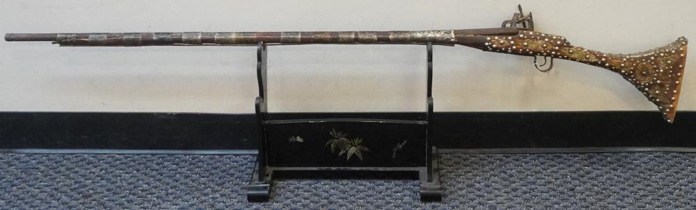 PROBABLY BERBER NAIL STUDDED