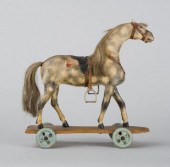 PULL-TOY HORSE ON WHEELSA fine