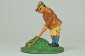 PUTTING GOLFER DOORSTOP One of