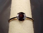 PYROPE GARNET AND FOURTEEN KAR