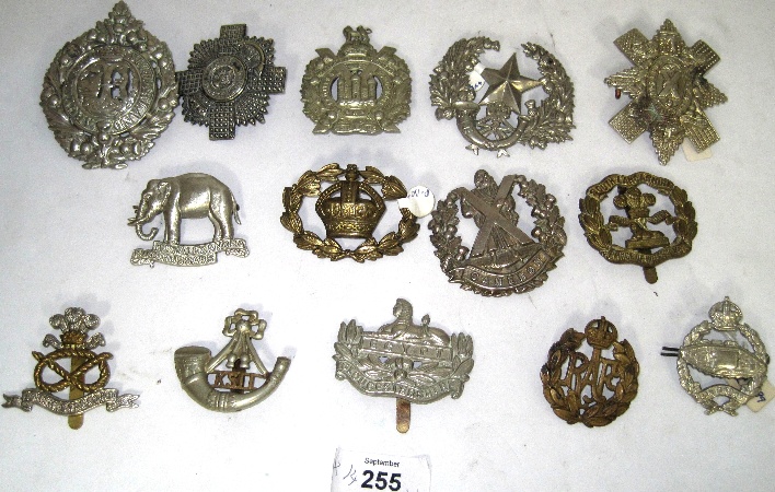 Quantity of Various Cap Badges to