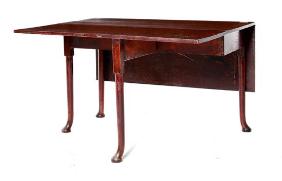 Queen Anne mahogany dining table