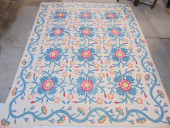 QUILT WITH FLOWERS ON BRANCHES