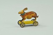 RABBIT ON WHEELS PENNY TOY Mei